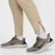 Брюки чоловічі Nike Unlimited M Бежевий FB7548-251 - зображення 5