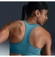 Спортивный топ женской Nike Swoosh Sports Bra M Зелений DX6821-006 - изображение 3