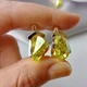 Серебряный комплект 925 пробы с золотыми пластинами 375 пробы с цирконом салатового цвета - изображение 2