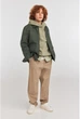 Підліткова джинсова куртка H&M 061223548 134/8-9Y Хакі (6666000381491) - изображение 1