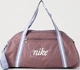 Сумка Nike W NK GYM CLUB - RETRO 24L коричневий Жін 33 × 51 × 23 см - зображення 1