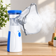Портативный ультразвуковой небулайзер Mesh Nebulizer JSL-W302 Компактный ручной ингалятор для детей и взрослых с 2 масками для домашнего использования. - изображение 6