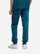 Спортивные штаны мужские Puma Ess Block Sweatpants 694346-36 L Синий/Зеленый/Черный (4070033466919) - изображение 2