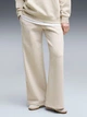 Спортивные штаны на флисе женские Puma ESS Wide Leg Pants 69291982 XS Бежевые (4070033450574) - изображение 1