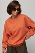 Базовий світшот oversize з начосом - помаранчевий колір, M/L - зображення 2