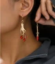 Серьги разные кинжал и рука с кристаллами, 3076 - изображение 1