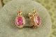 Серьги Xuping Jewelry Магический овал с розовым камнем 1.7 см золотистые - изображение 1
