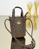 Женская мини сумка Coach для телефона, кроссбоди через плечо - изображение 1