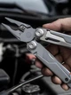 Мультитул Grand Harvest GHK9 15 в 1 складной многофункциональный инструмент из нержавеющей стали 440A с плоскогубцами ножом ножницами пилой кусачками отвёртками карабином и нейлоновым чехлом - изображение 4