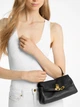 Сумка крос-боді через плече жіноча з натуральної шкіри маленька Michael Kors 32F6ANXC0E-001 Чорна (800070364515) - зображення 2