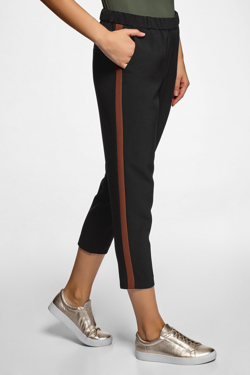 

Женские черные брюки Oodji 38-170 11703097/42830/2931B