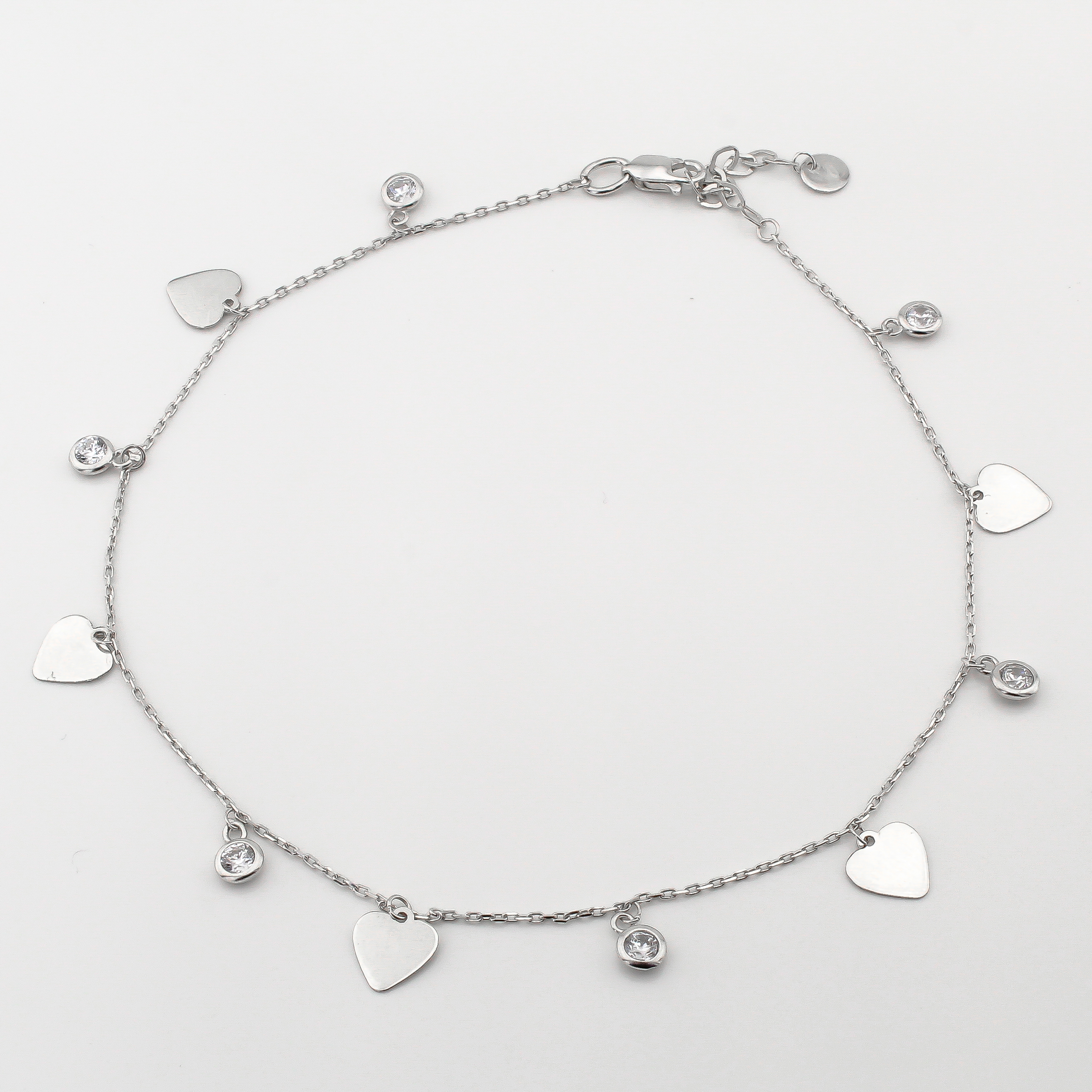 

Браслет на ногу Сердечки в белом золоте B15652 Диамант