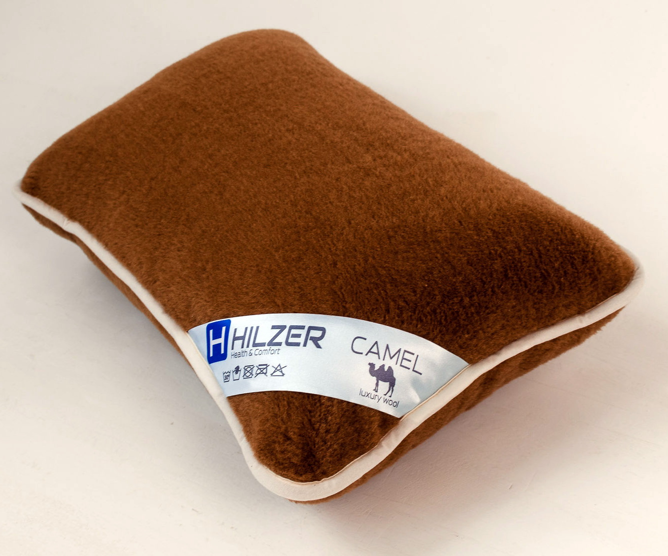 

Гіпоалергенна подушка HILZER 40х75 з шерстяного італійського полотна Woolmark