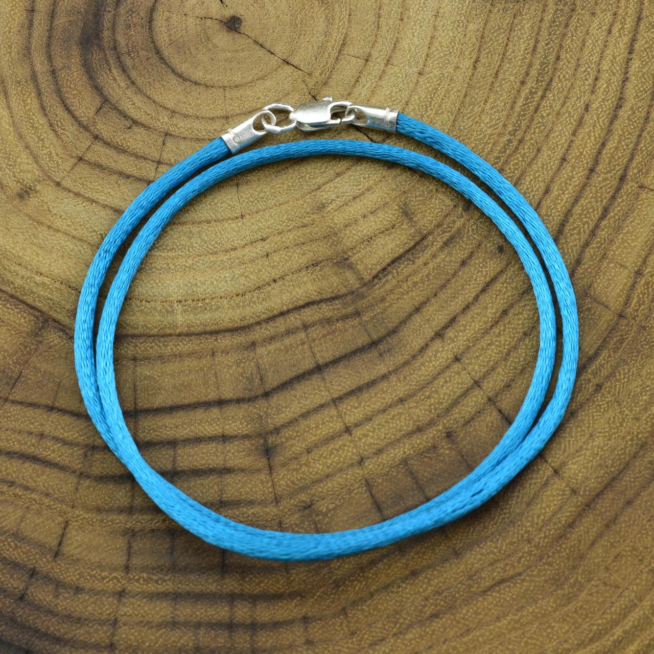 

Шнурок шелковый цвет бирюзовый длина 35 см ширина 2 мм вес серебра 0.7 г