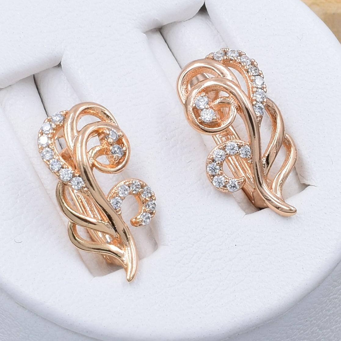 

Серьги Xuping 30341 размер 17х8 мм белые фианиты вес 2.1 г позолота 18К