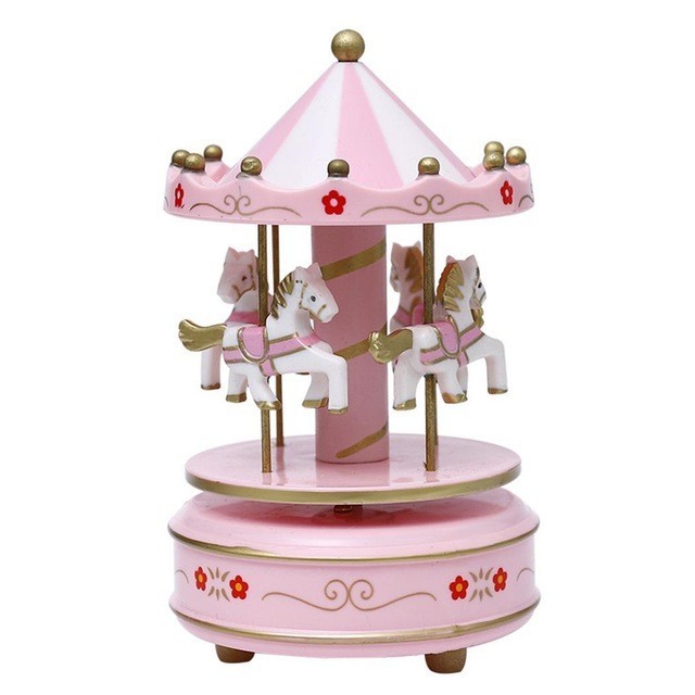 

Новогодняя музыкальная игрушка карусель Melodious с лошадками