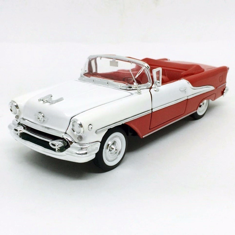 

Машинка инерционная металл 1:24 OLDS MOBILE 22432W WELLY белый с красным