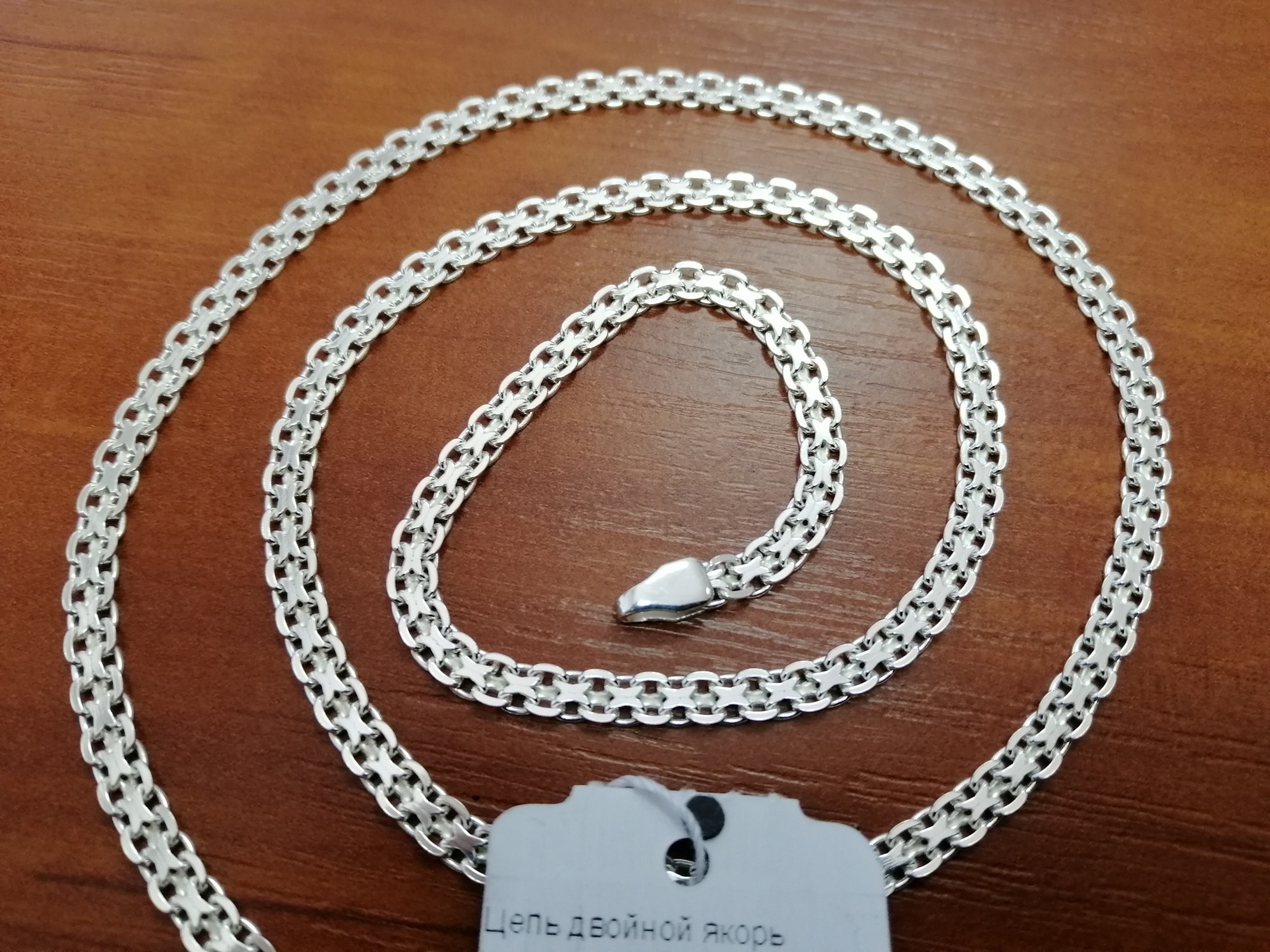 

Серебряная женская цепь Двойной якорь 65см / 4мм белый