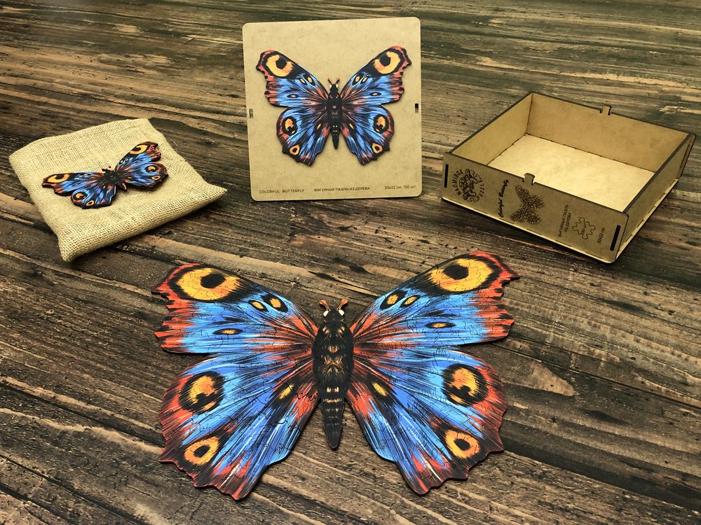

Дерев'яні пазли NaomiBox Colorful Butterfly 32 x 26 см.