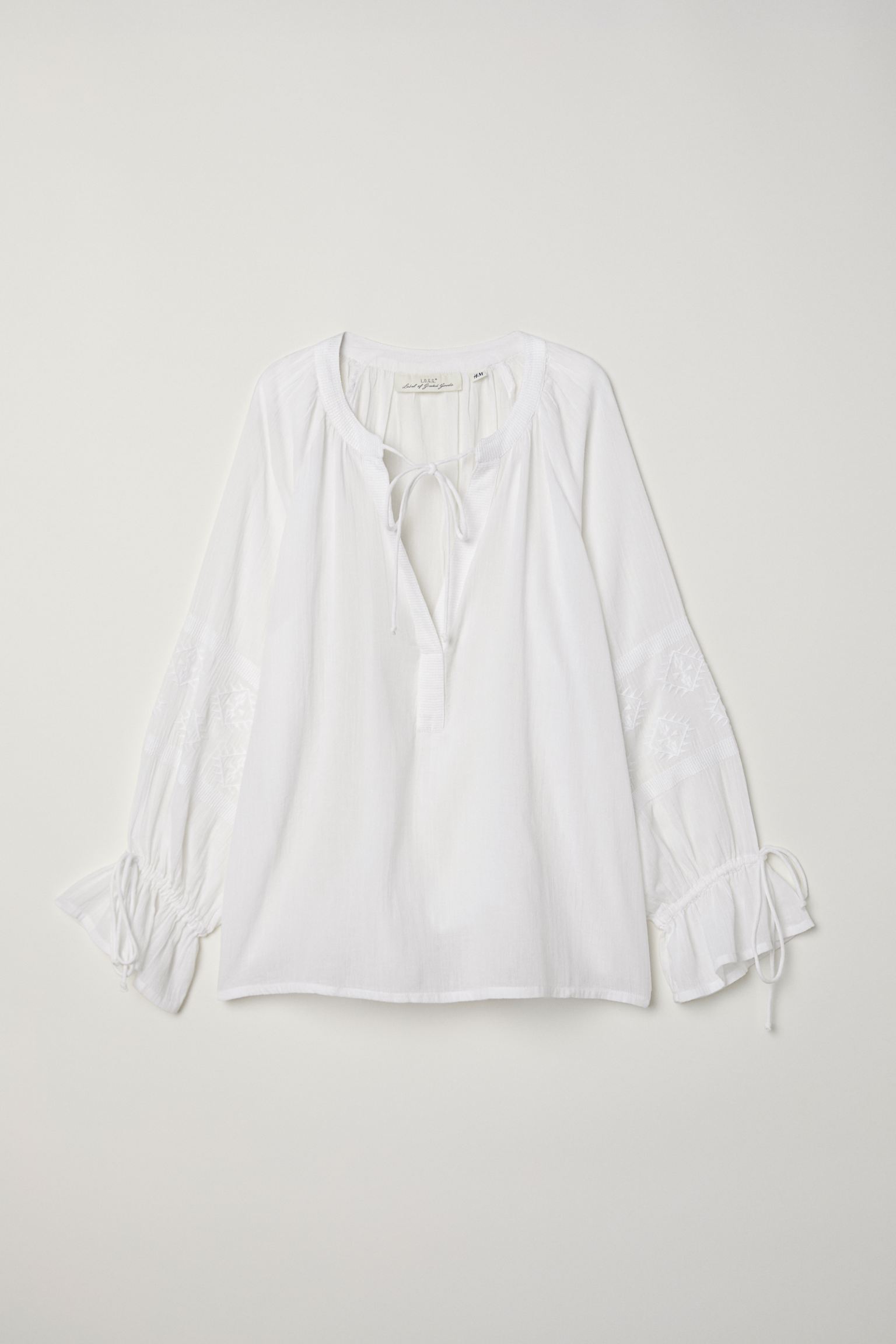 

Блуза H&M 42 белый 23026824308