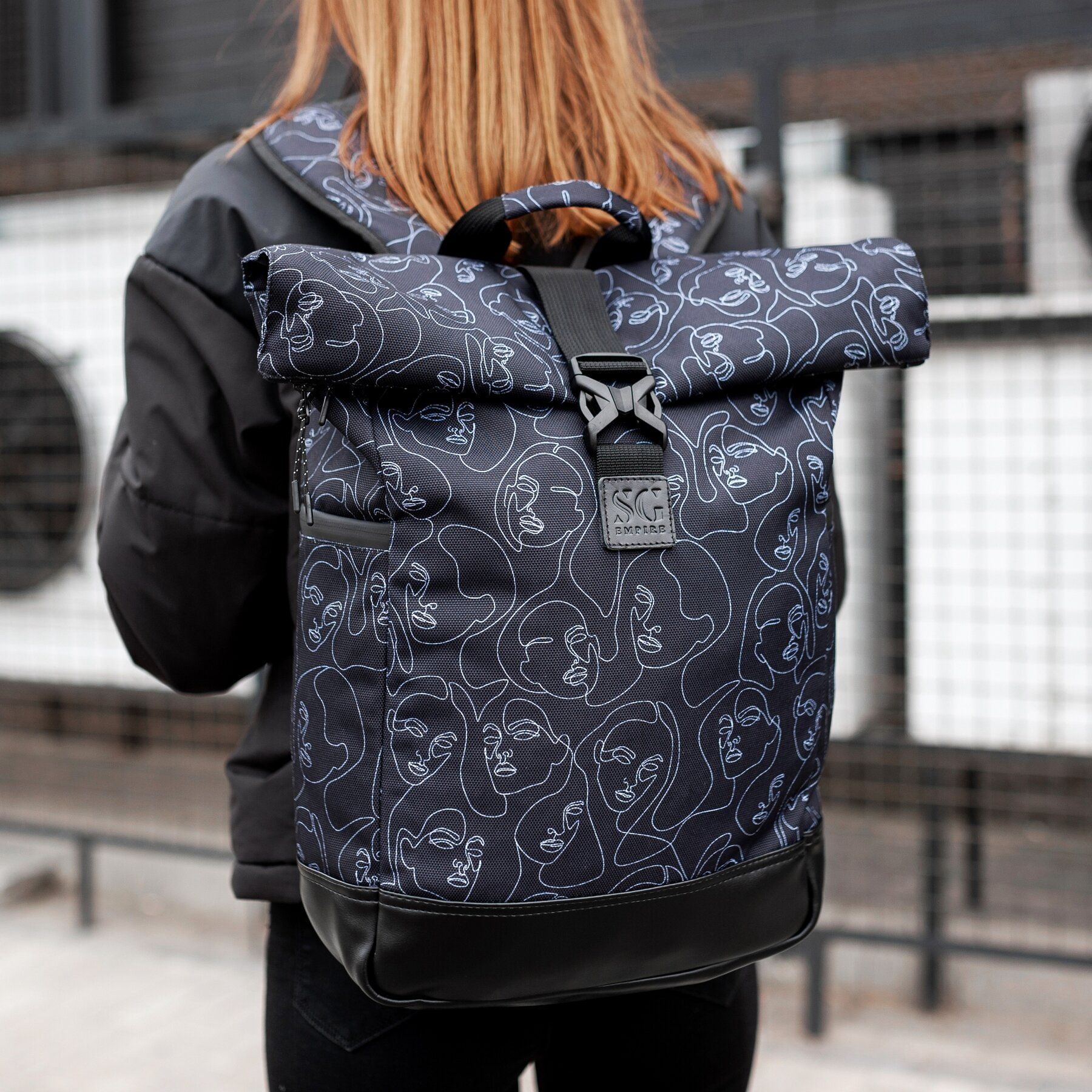 

Рюкзак роллтоп SG Empire Travel bag лица черный RKTB04024