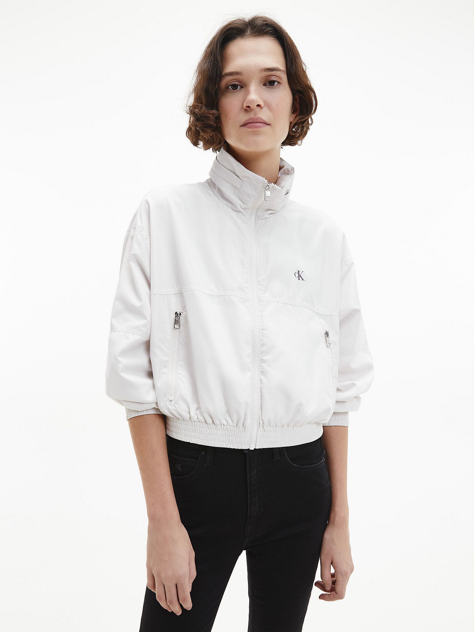 

Ветровка Calvin Klein Jeans Aop Packable Hood Windbreaker J20J215643-PGA S White Sand/String