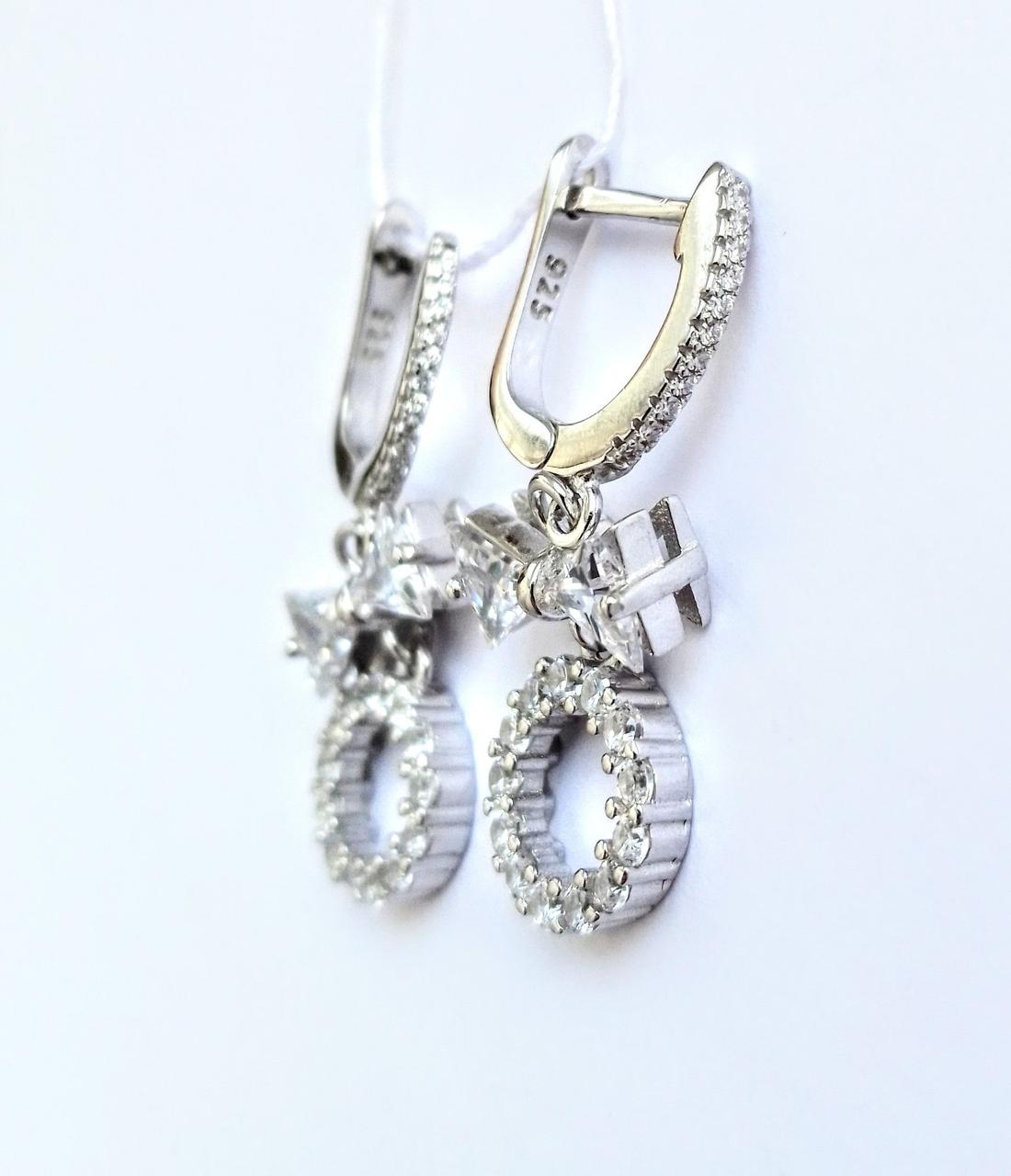 

Серебряные серьги с бантиками 097849