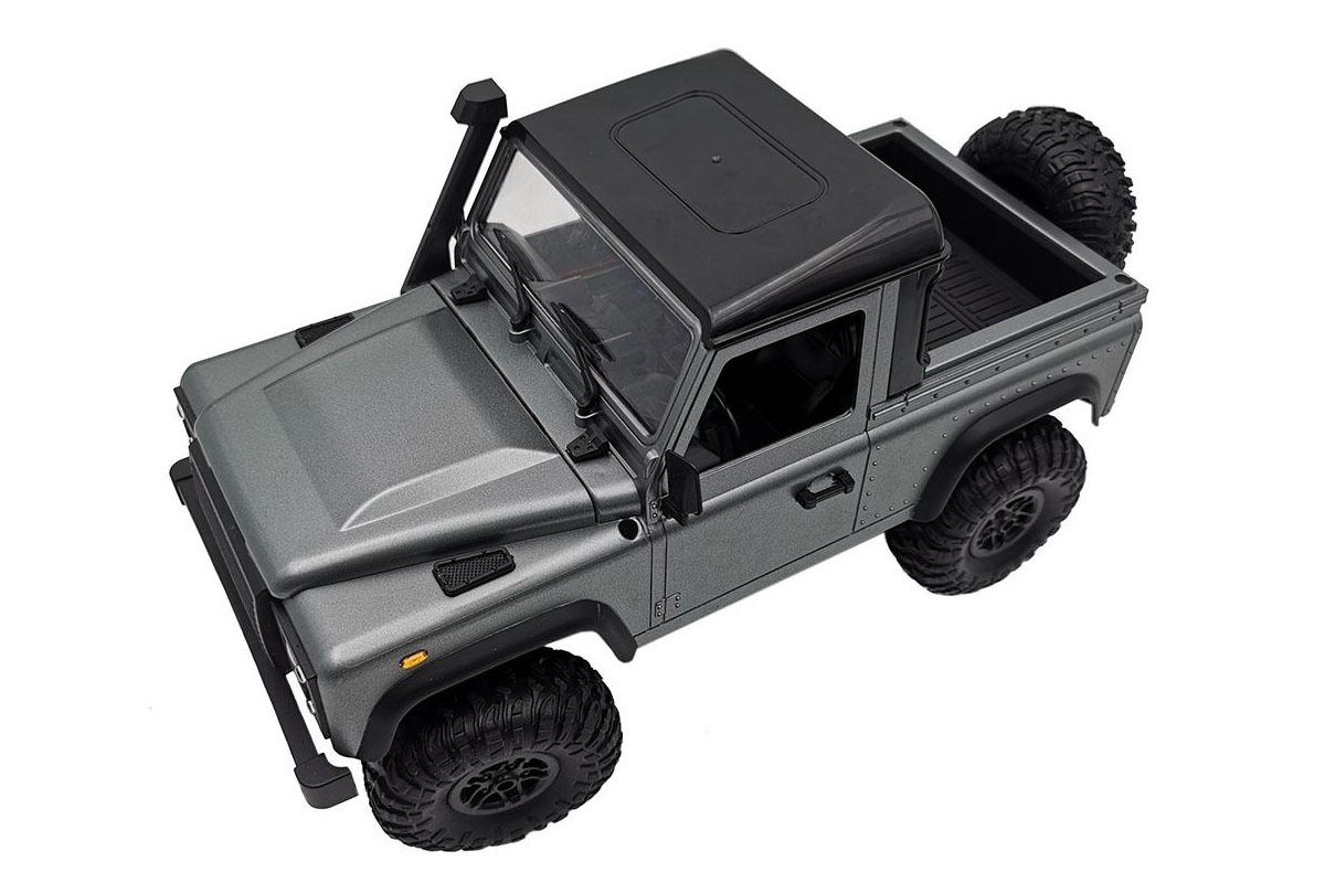 

Машинка на радиоуправлении 1:12 MN Model 99S Defender полноприводный