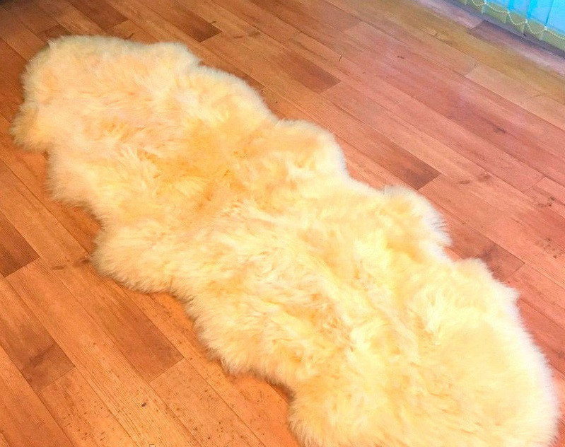 

Ковер из 2х овечьих шкур 70 * 200 см. Персиковый