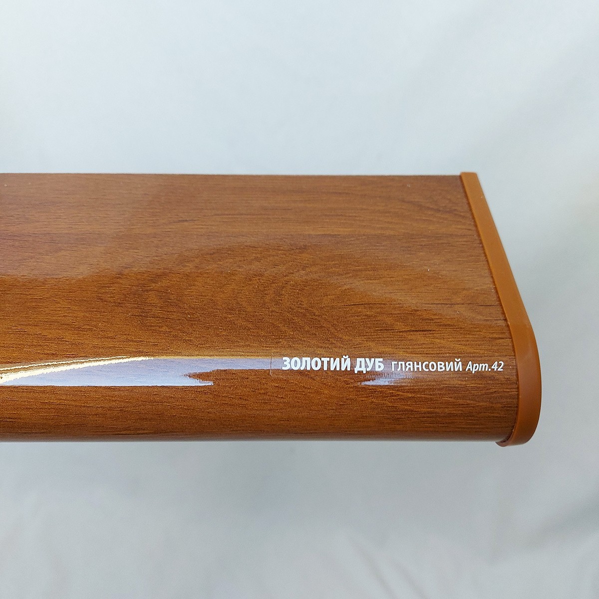 

Подоконник PLASTOLIT золотой дуб глянец 200х1200мм