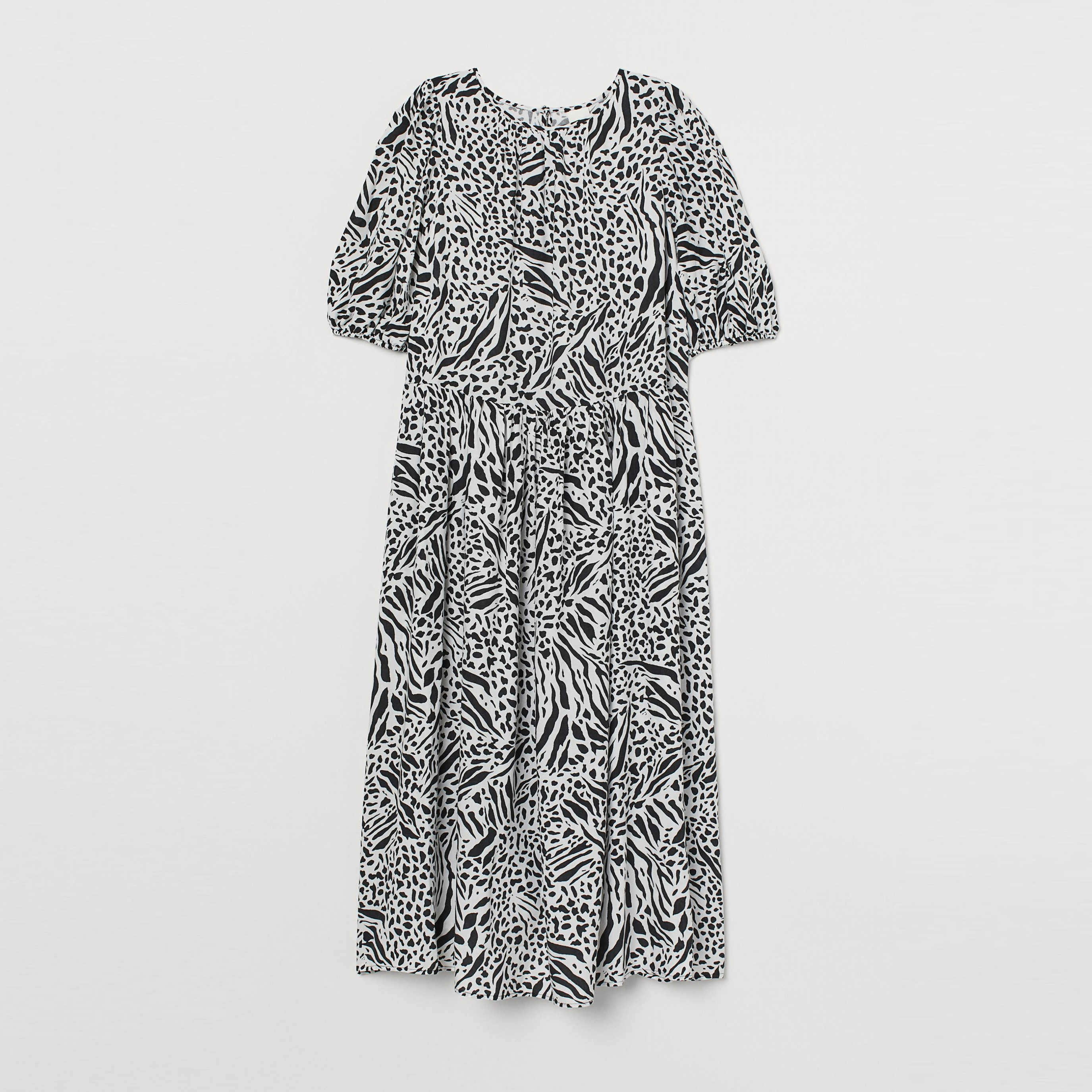 

Платье H&M 060852374 L Белое Принт зебры