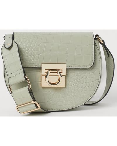 

Сумка H&M 6,5х15х20 см. Светло-зеленый