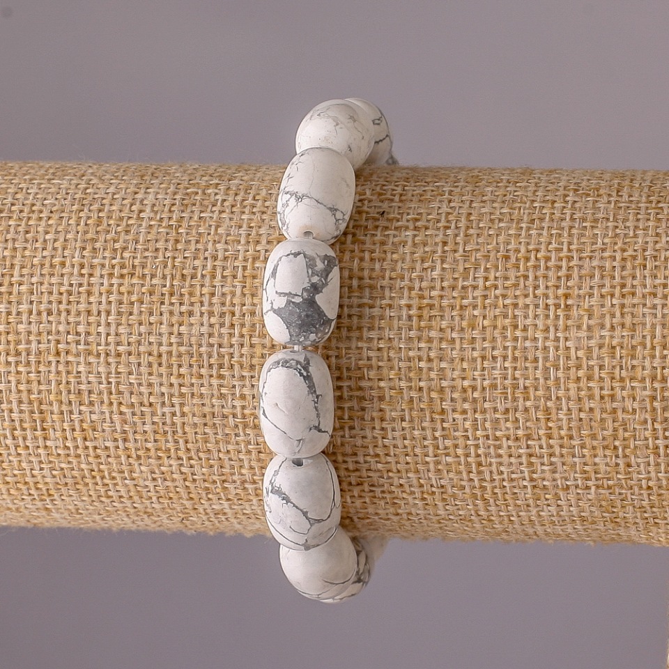 

Браслет натуральный камень Кахолонг бочонок на резинке 10х14мм обхват 18см, ida41310