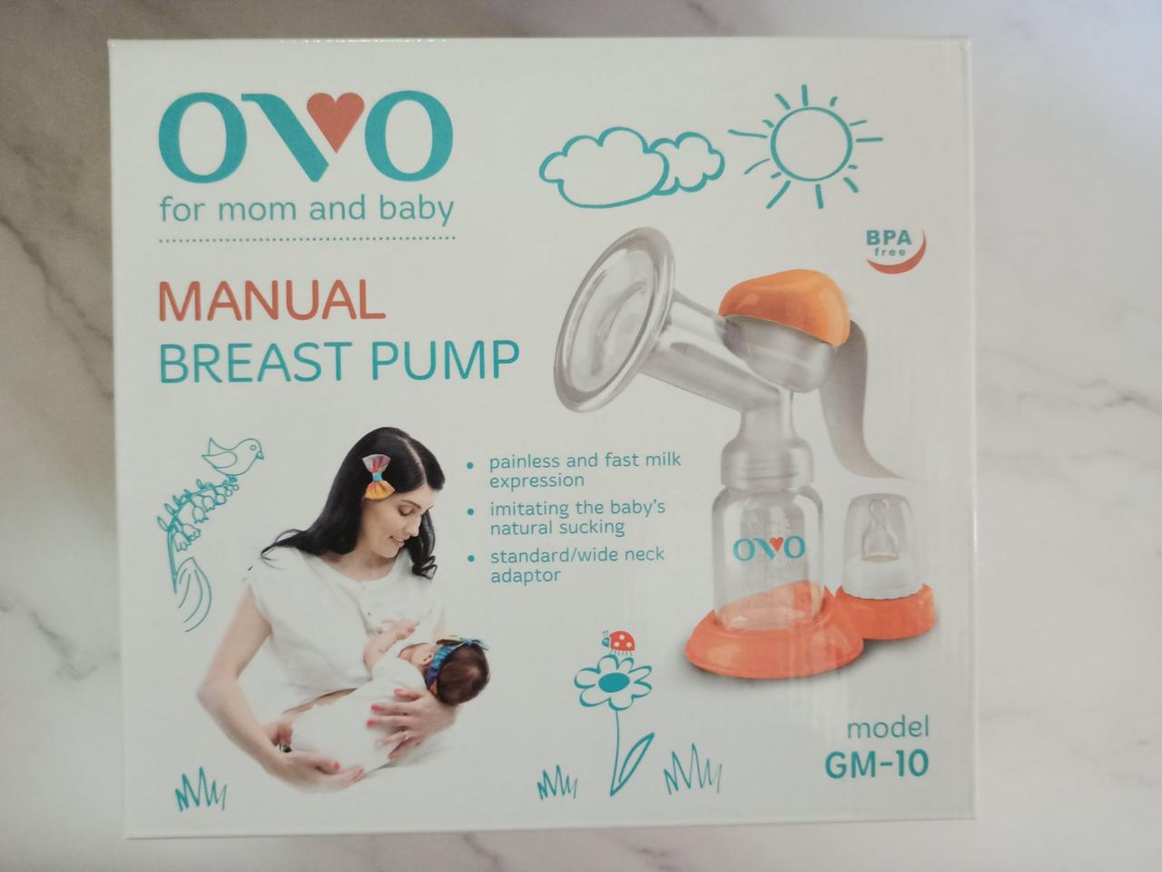 

Механический молокоотсос Ovo GM-10 оранжевый