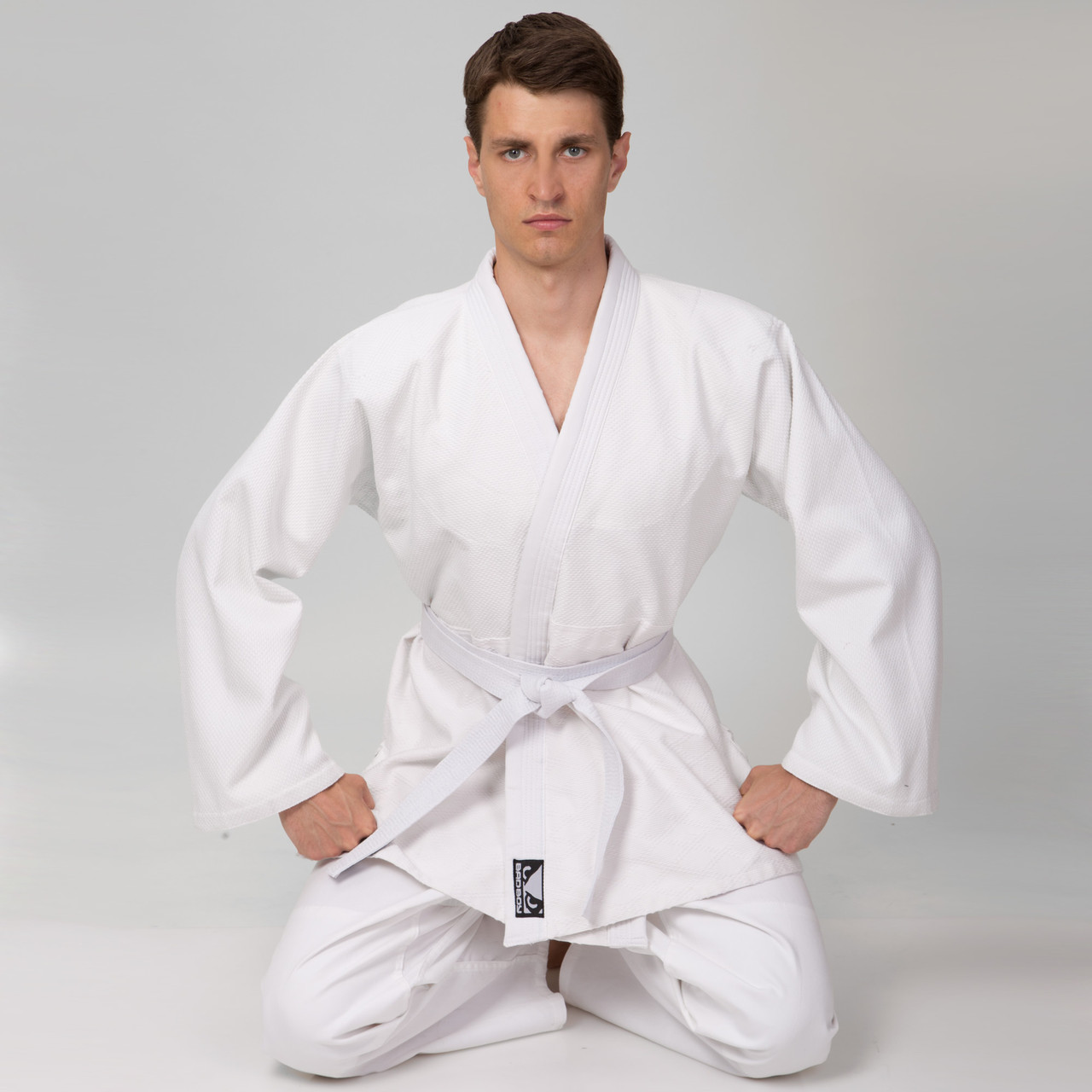 

Кимоно для дзюдо BAD BOY Heroe 8192 белое 450г/м2 размер XL рост 170 см