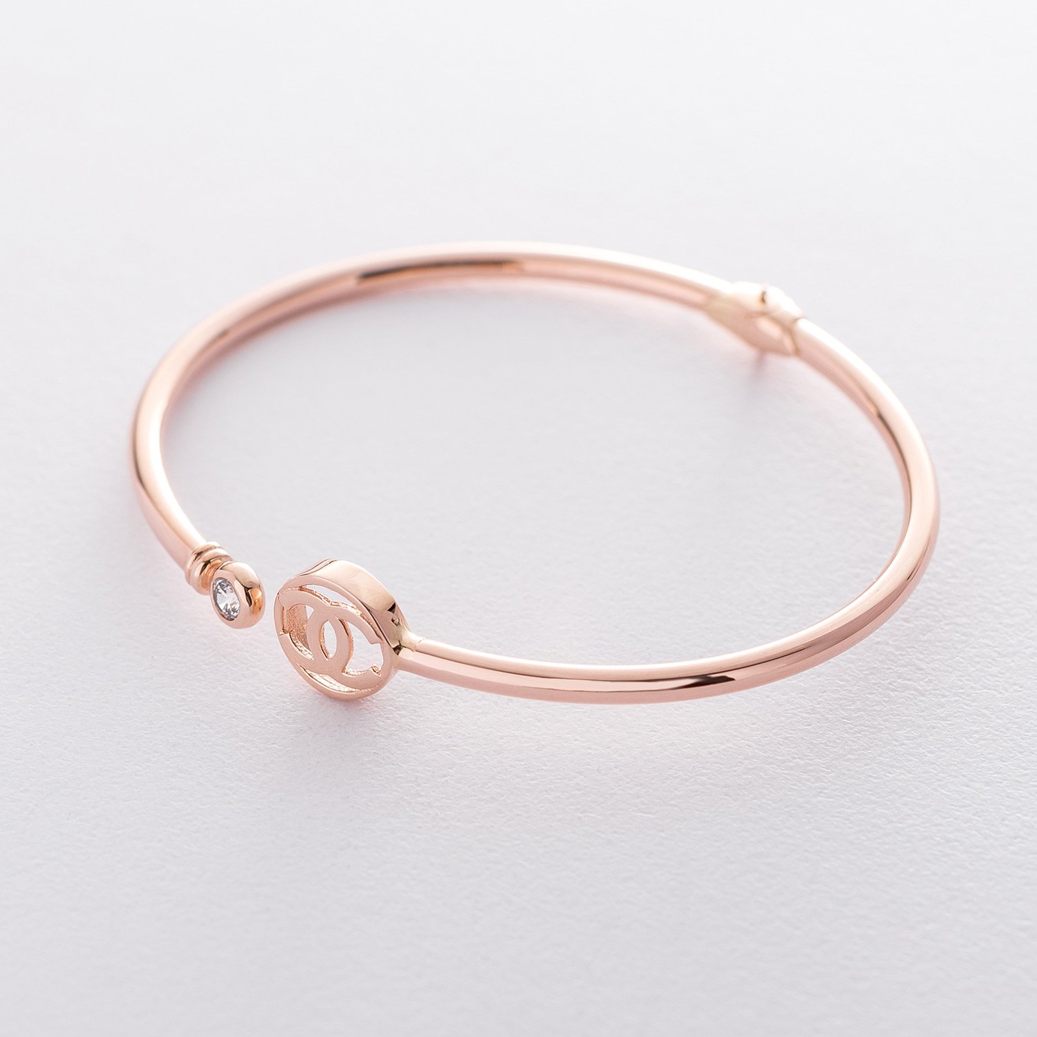 

Жесткий браслет из красного золота б04170 Оникс