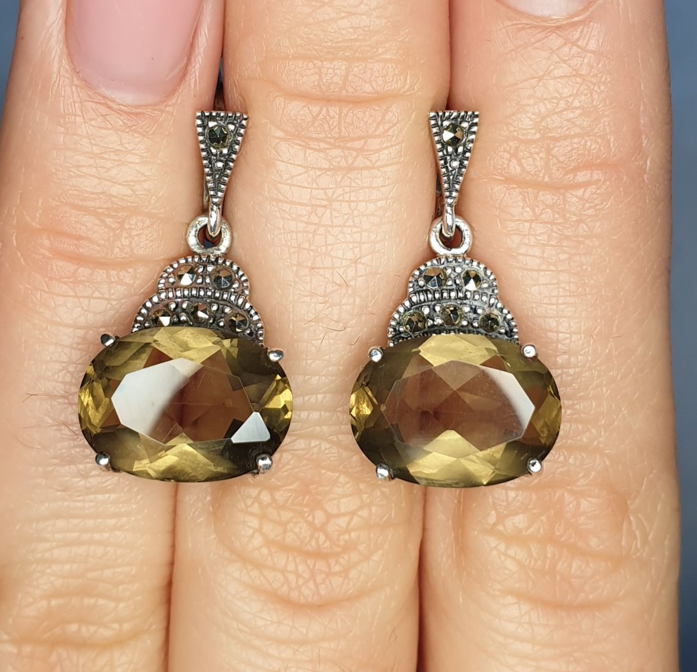 

Сережки серебряные с раухтопазом 7,53 г