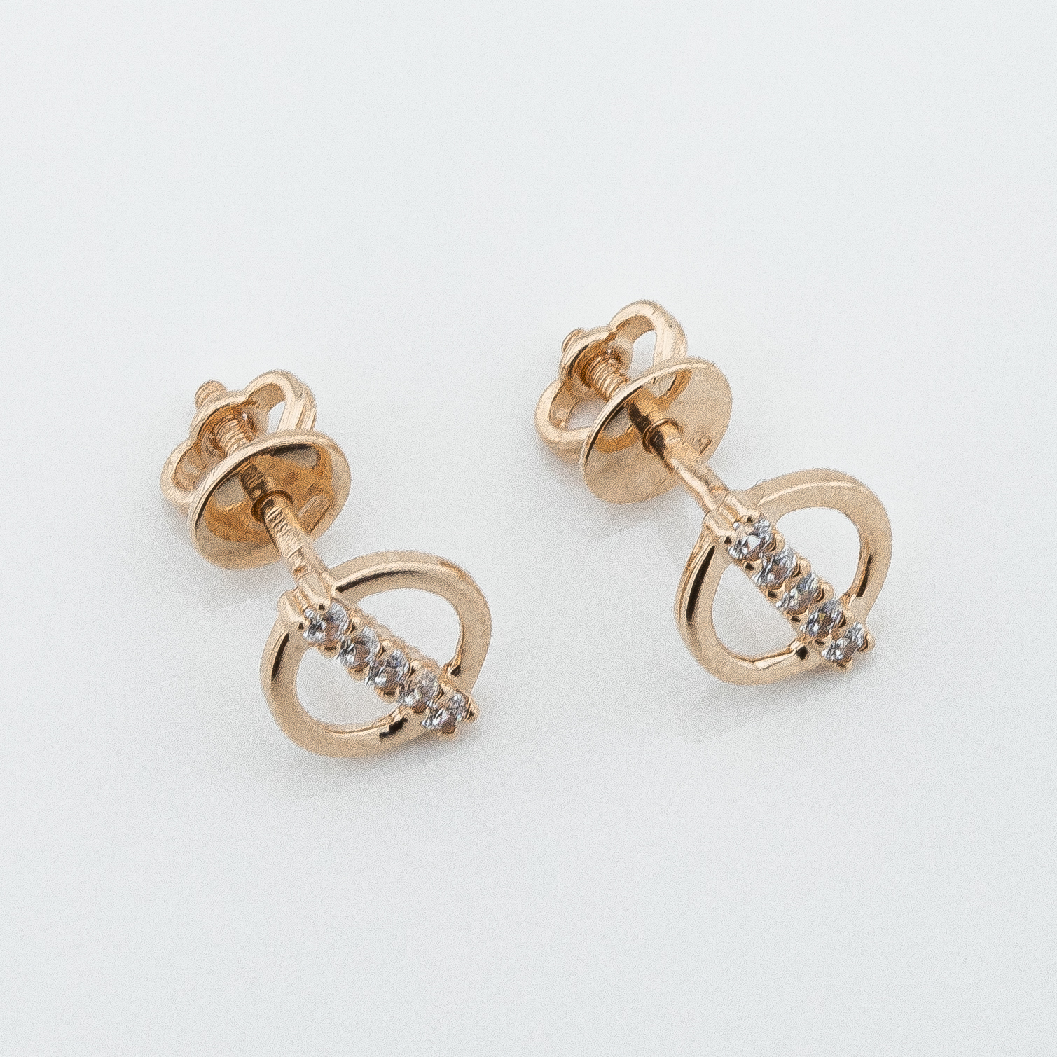 

Серьги-гвоздики с фианитами в красном золоте c121768 Диамант