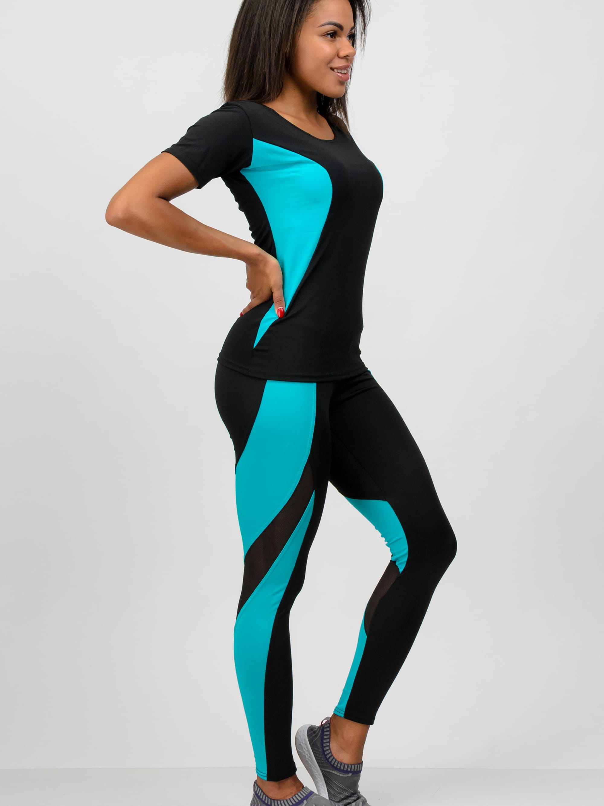 

Спортивный костюм Total Pro тп201975 XS-S Черный с бирюзовым