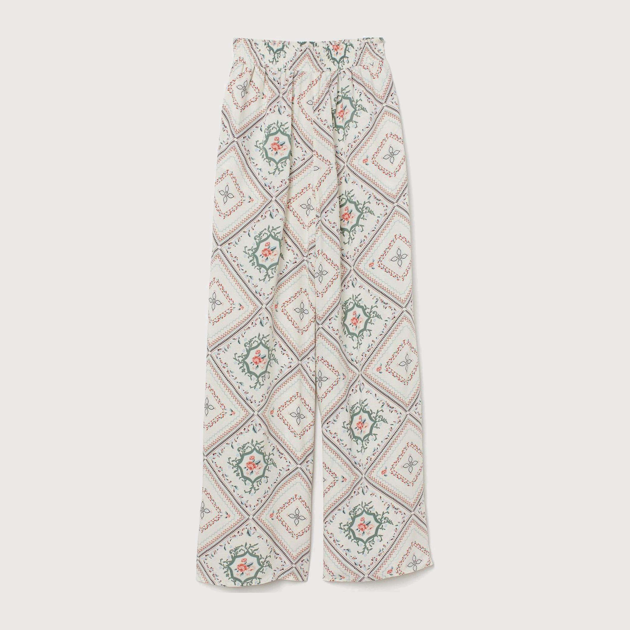 

Брюки H&M 6406620-ABSO 40 Молочные с разноцветным