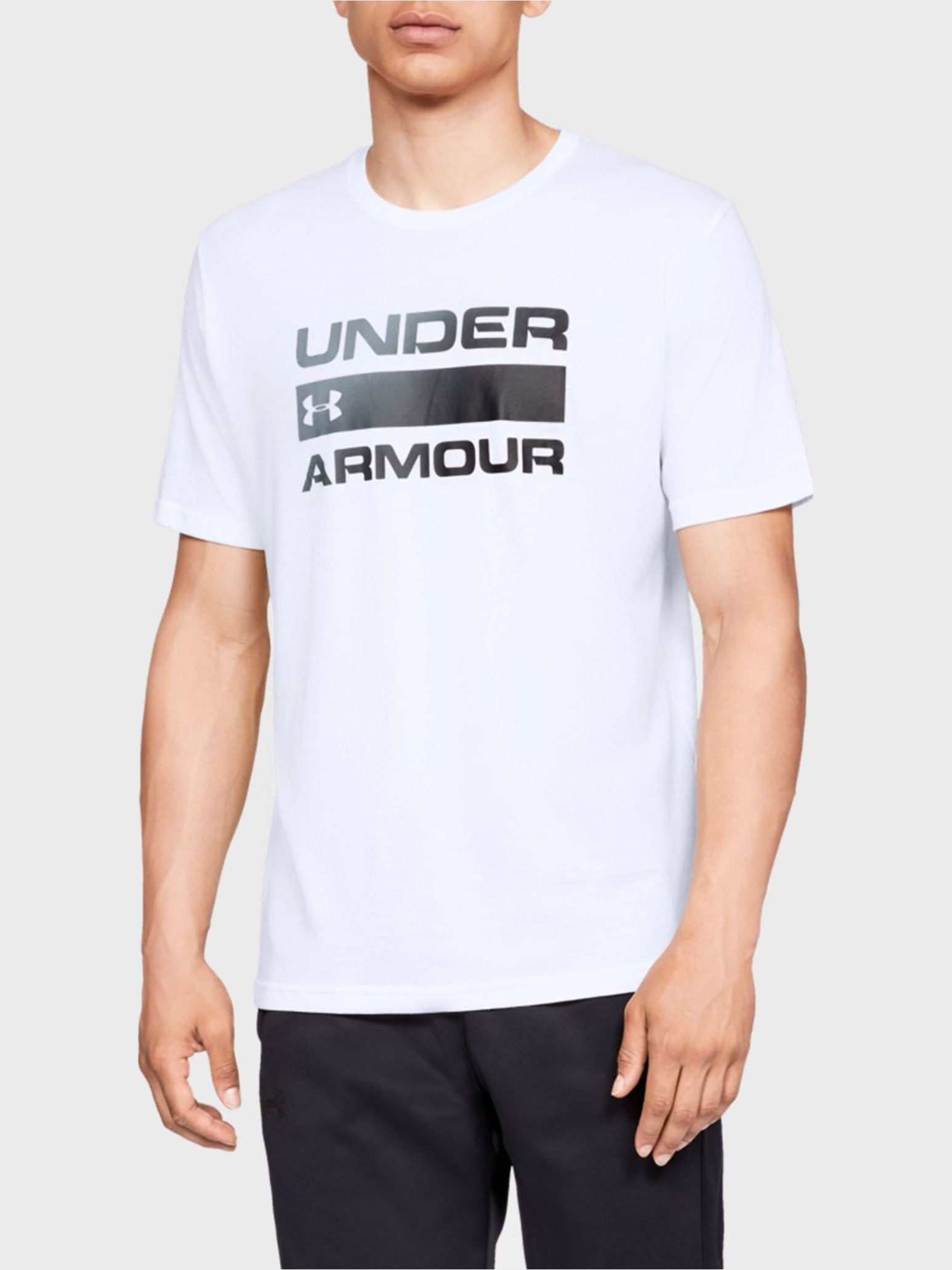 Акція на Футболка чоловіча довга Under Armour Ua Team Issue Wordmark Ss 1329582-100 M Біла з принтом від Rozetka