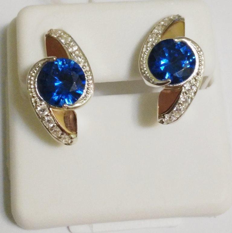 

Серьги из серебра с синим кристалом Завиток, 0345.10