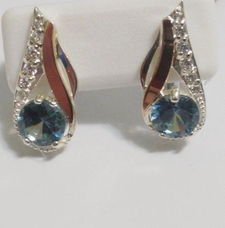 

Серьги из серебра и золота с голубым кристалом Венера, 0361.10