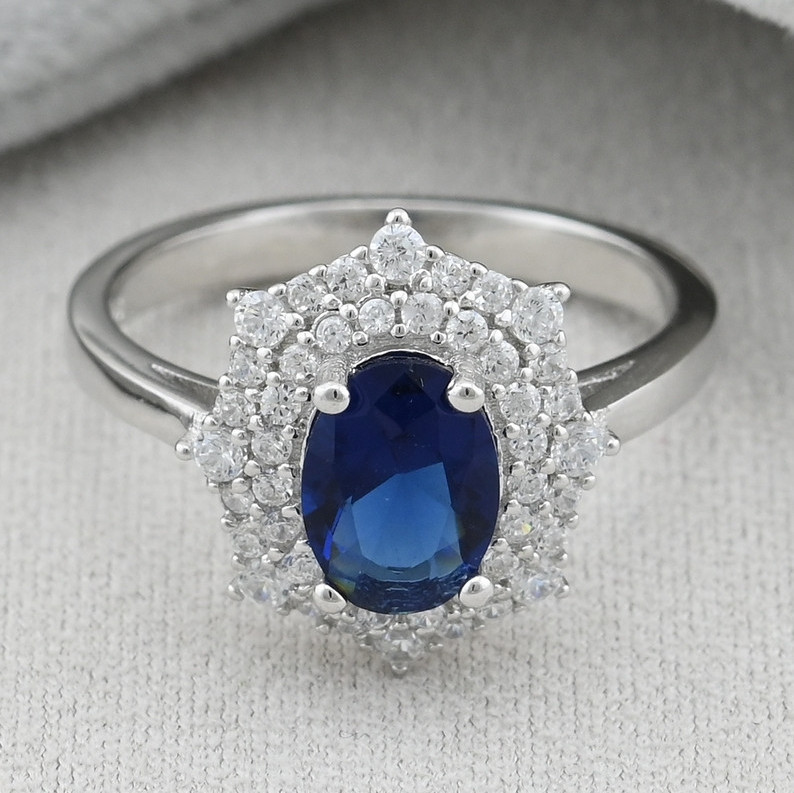 

Серебряное кольцо вставка синие фианиты 19