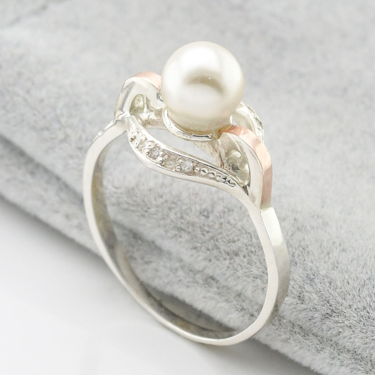 

Серебряное кольцо с золотом Улыбка вставка искусственные жемчужины 18