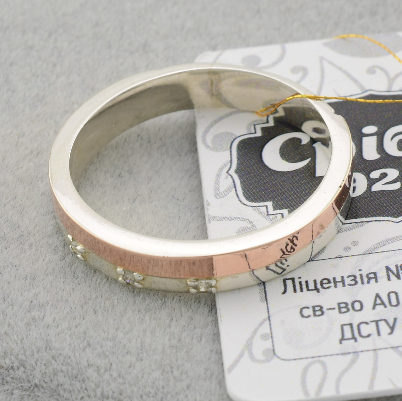 

Серебряное кольцо с золотом ЯК280 белые фианиты 16