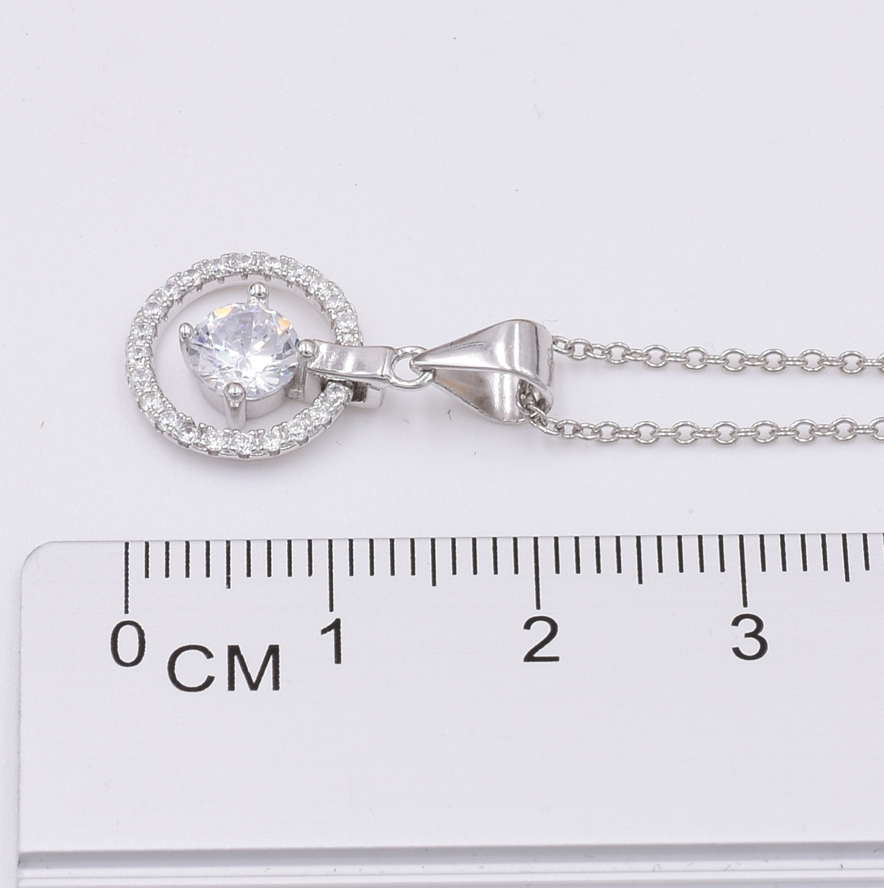 

Серебряный кулон размер 20х12 мм вставка белые фианиты вес 1.3 г