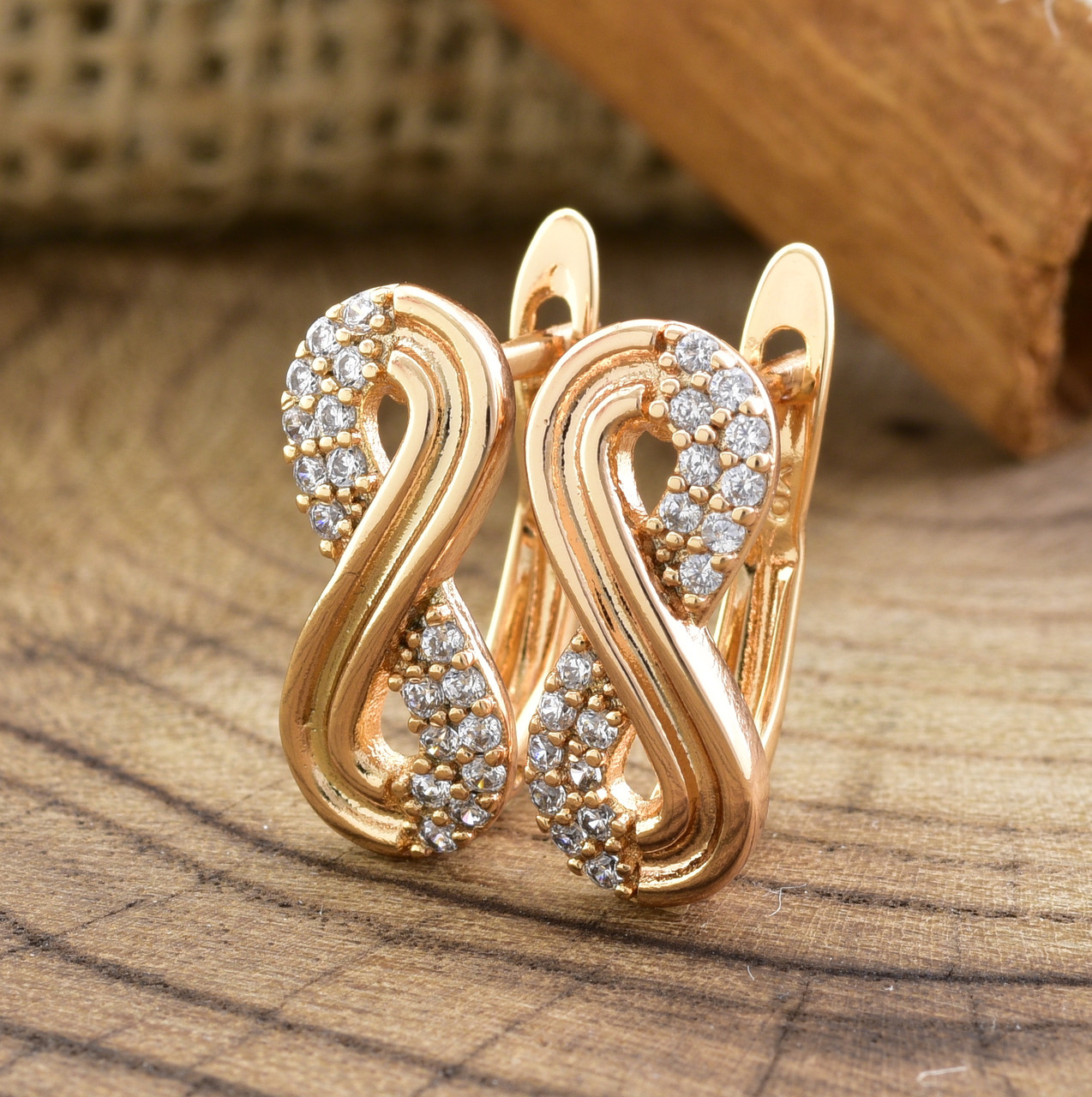 

Сережки Xuping 25892 розмір 20х8 мм білі фіаніти вага 2.8 г позолота 18К