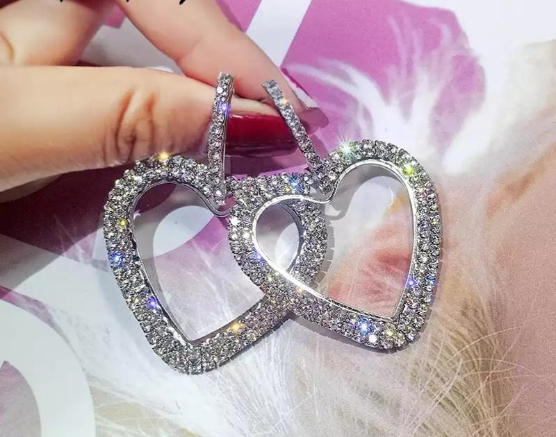 

Серьги женские (бижутерия) Oxa сердца серебристые