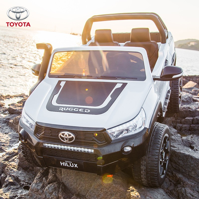 

Детский двухместный электромобиль Джип Toyota Hilux 4WD (MP4) белый Bambi